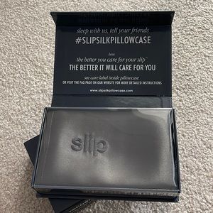 2 never opened or been used slip silk pillow cases in grey